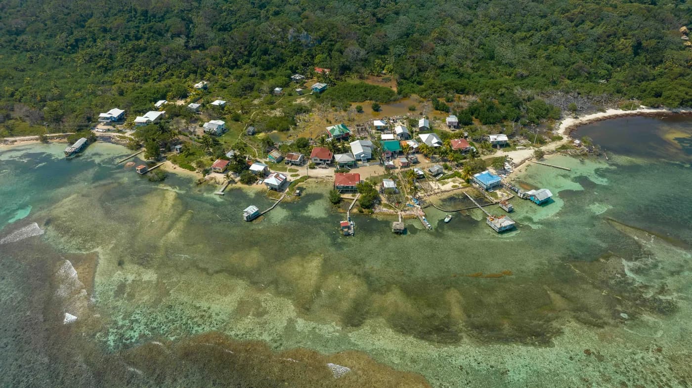 Aerial view of homes and docks along the Saint Helene shoreline